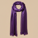 Deep purple satin scarf with satin sheen on warm beige background
